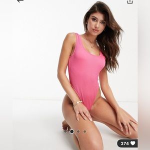 River Island crinkle textured scoop neck swimsuit in bright pink, size 4